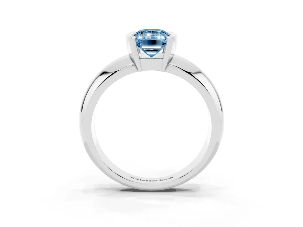 Fancy Blue Emerald Cut Solitaire Tension Set Diamond Ring with Wide Band Silver