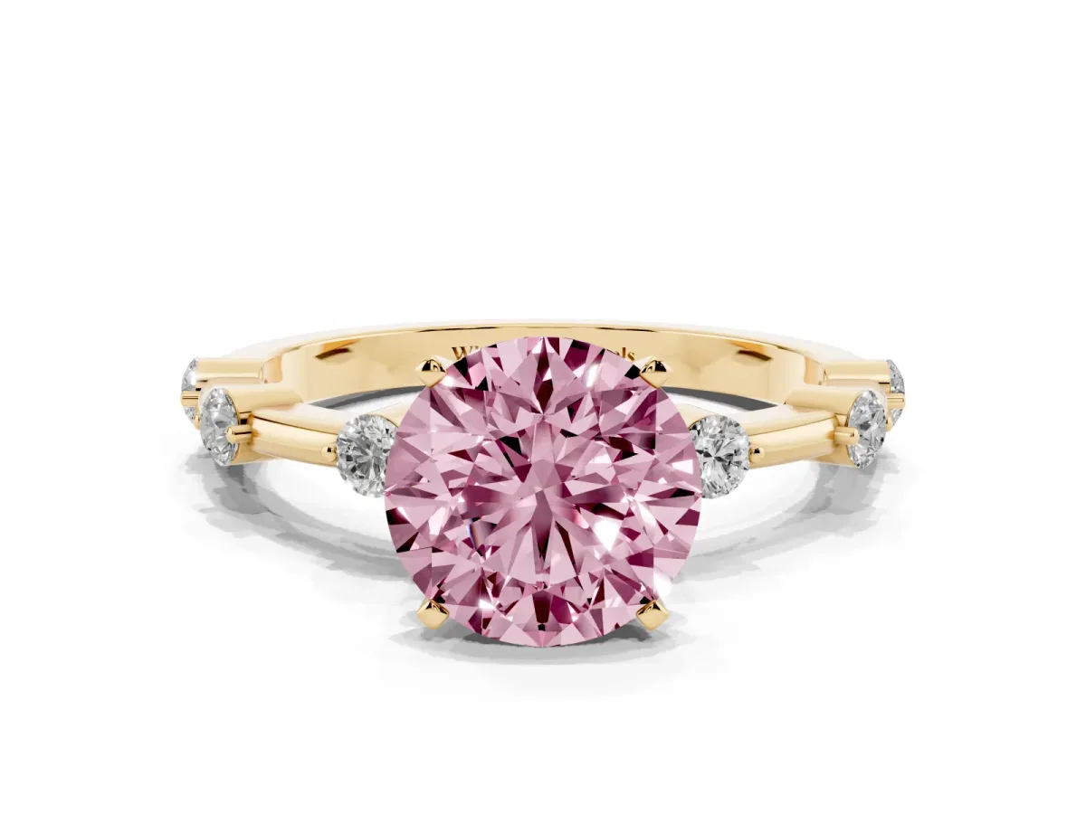 Fancy Pink Round Cut Solitaire Diamond Ring with Bezel Set Side Stones and Prong Setting Yellow gold