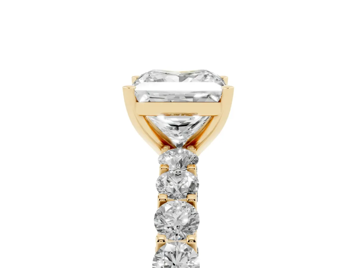 Princess Cut Diamond Solitaire Ring with Shared Prong Pavé Band and Four-Prong Setting Yellow gold