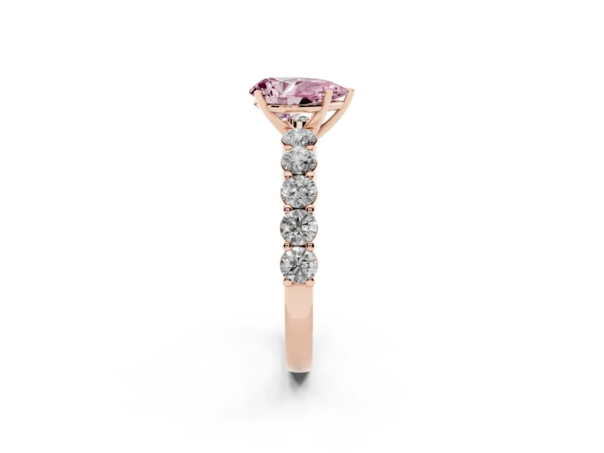 Fancy Pink Pear Cut Diamond Solitaire Ring with Shared Prong Round Side Stones Rose gold