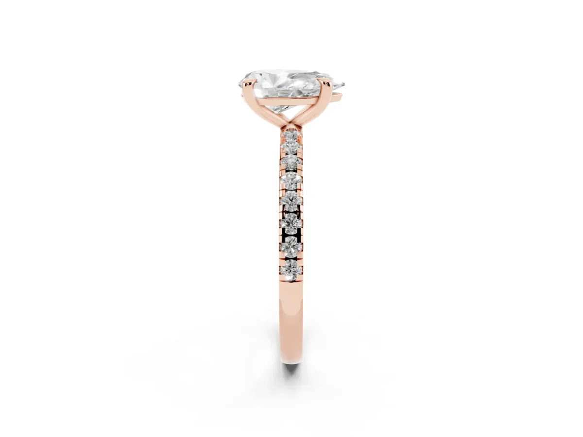 Pear Cut Diamond Brilliant Solitaire Ring with Pavé Band and Four-Prong Setting Rose gold