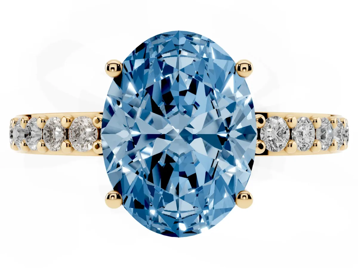 Fancy Blue Oval Cut Cut Diamond Solitaire with Pave Band and Four-Prong Setting Yellow gold
