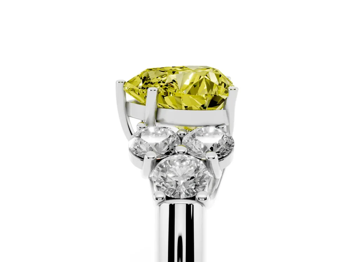 Fancy Yellow Heart Cut Cut Diamond Cluster Ring with Round Accent Stones and Prong Setting on a Classic Band White gold