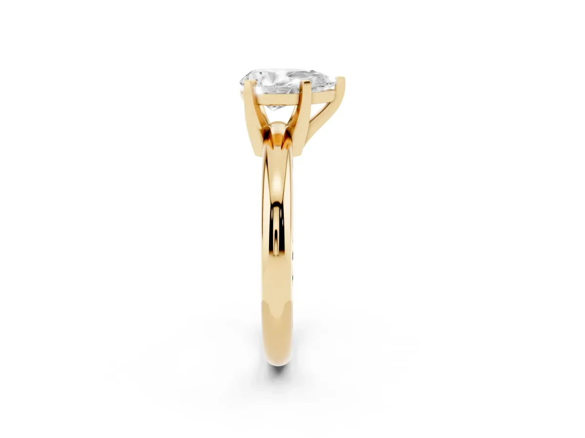 Pear Cut Diamond Solitaire Engagement Ring with Round Band and Four-Prong Setting Yellow gold
