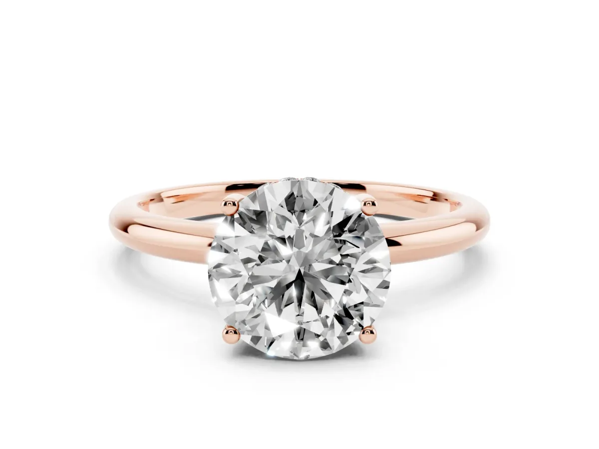 Round Cut Cut Solitaire Engagement Ring with Four-Prong Setting and Classic Band Rose gold