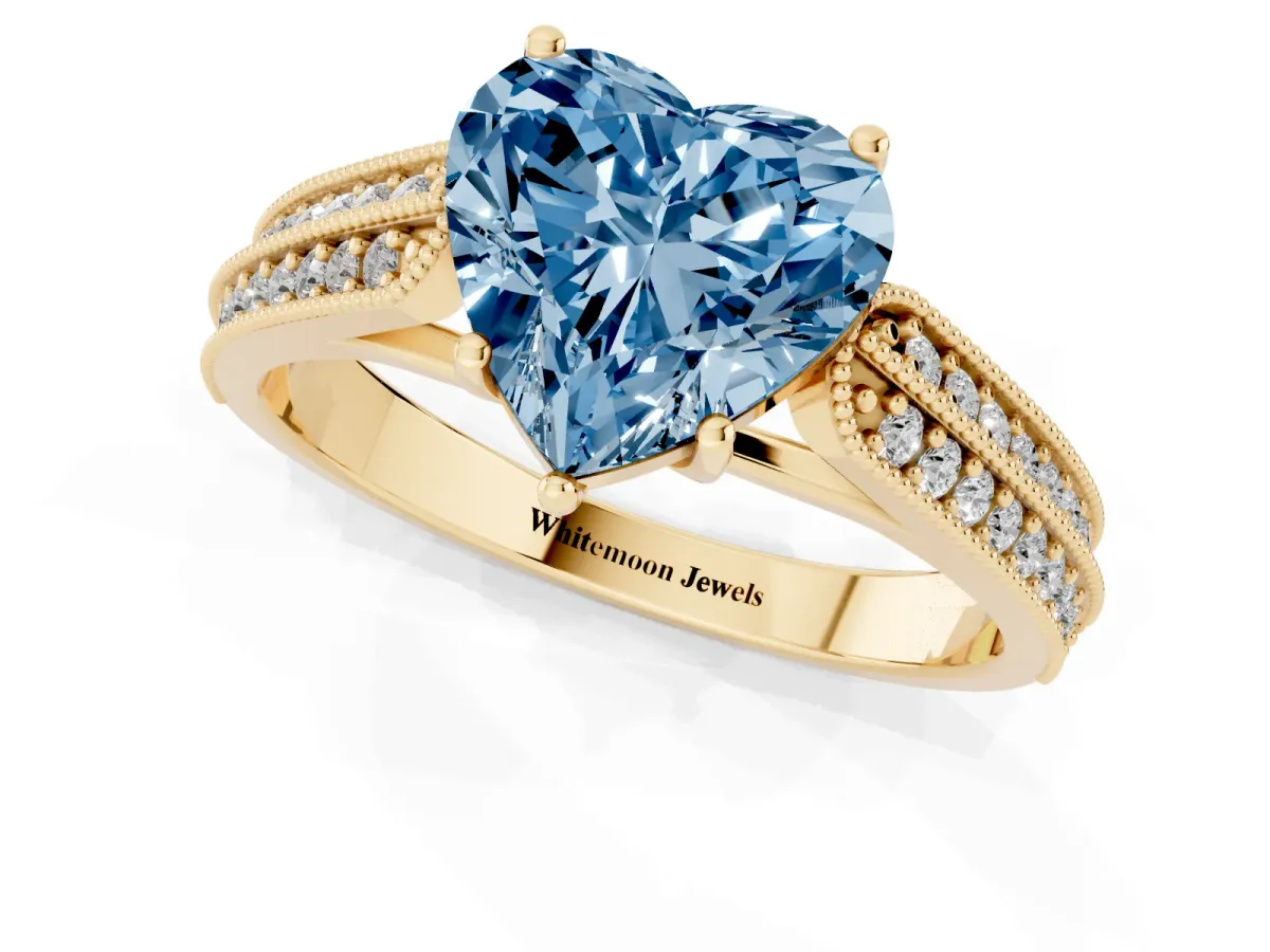 Fancy Blue Heart Cut Cut Pave Split Shank Engagement Ring with Four-Prong Setting Yellow gold