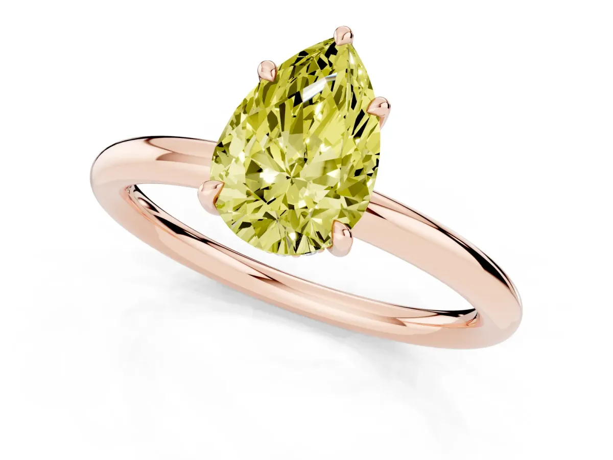 Fancy Yellow Pear Cut Diamond Solitaire Ring with Thin Band and Four-Prong Setting Rose gold