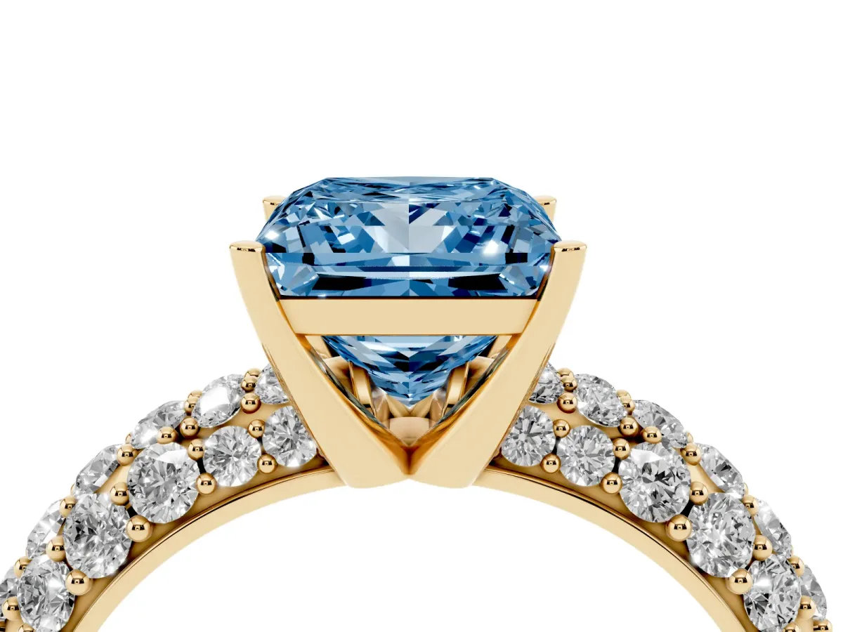 Fancy Blue Princess Cut Diamond Pavé Band Solitaire Ring with Four-Prong Setting Yellow gold