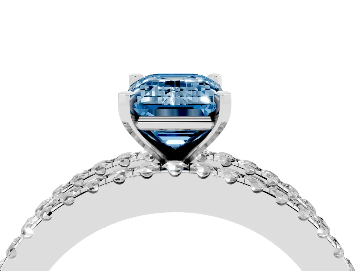 Fancy Blue Emerald Cut Diamond Solitaire Ring with Pavé and Channel Set Band Platinum