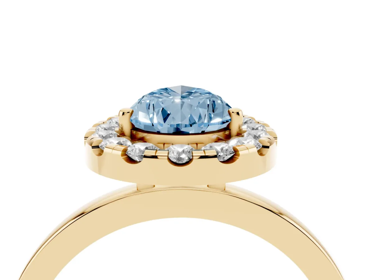 Fancy Blue Pear Cut Halo Diamond Solitaire with Pavé Band and Four-Prong Setting Yellow gold
