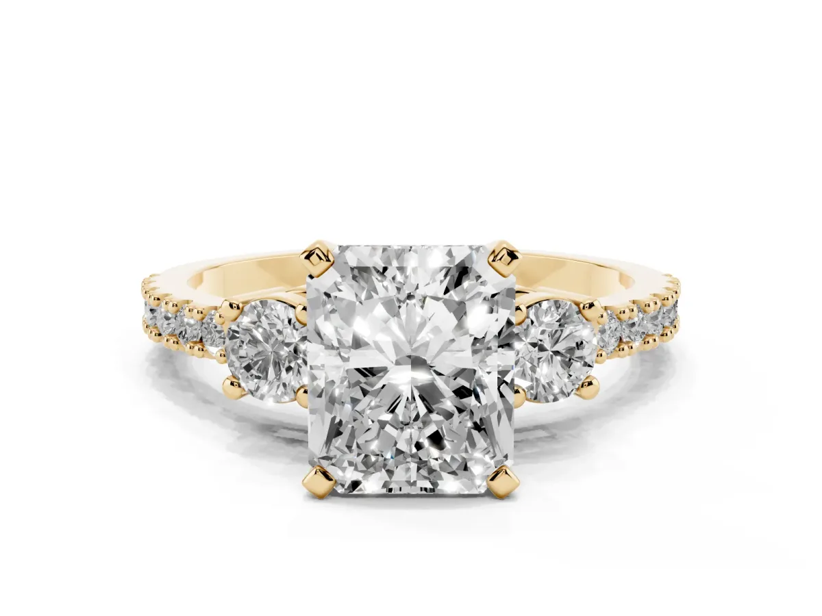 Radiant Cut Three-Stone Diamond Pavé Band with Prong Setting Yellow gold