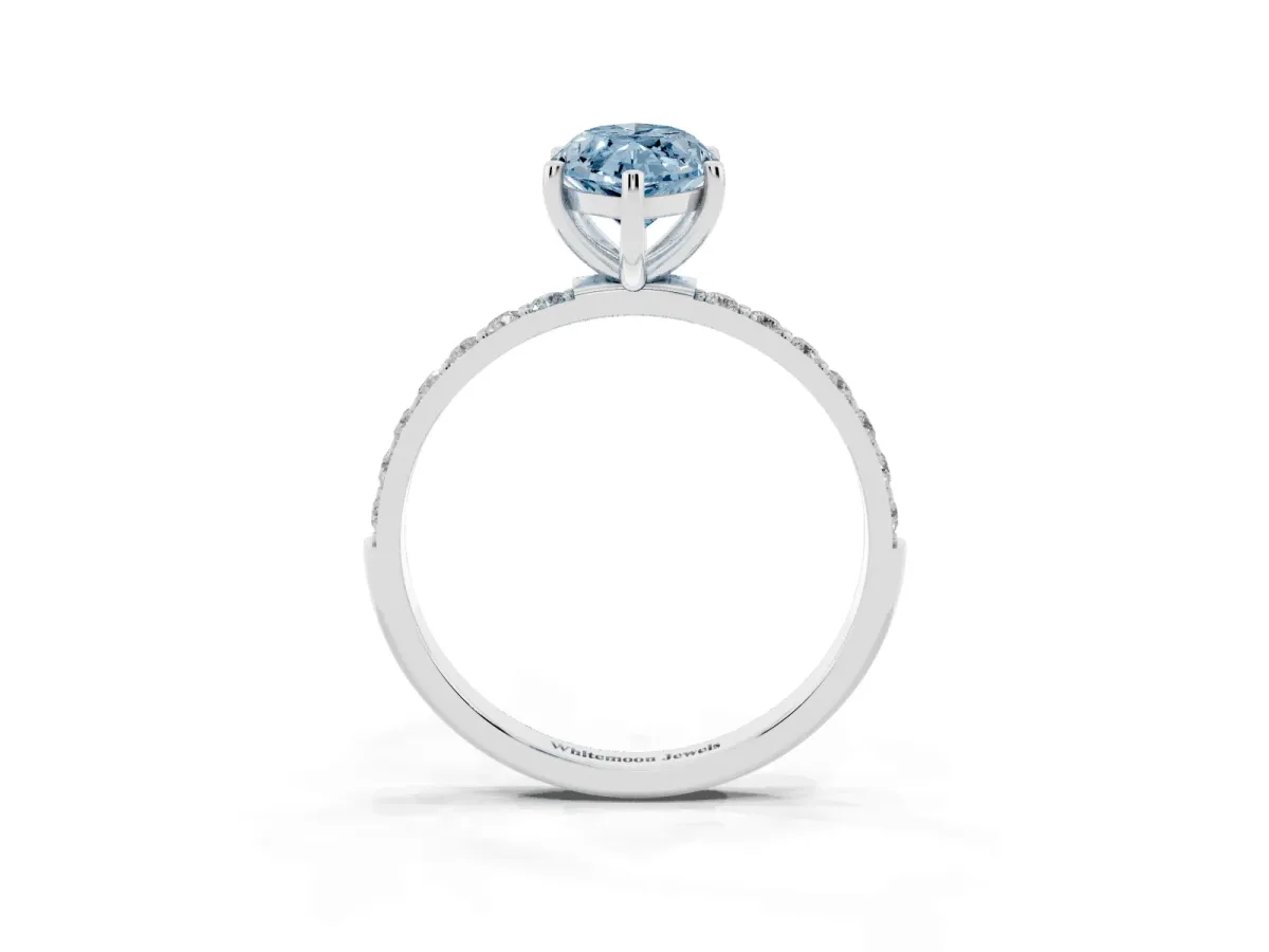 Fancy Blue Marquise Cut Diamond Solitaire Ring with Round Pavé Shoulders and Prong Setting Silver