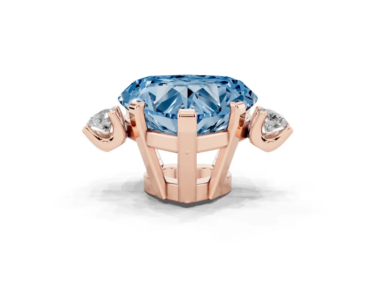 Fancy Blue Heart Cut Cut Three-Stone Solitaire Ring with Round Accent Diamonds and Four-Prong Setting Rose gold