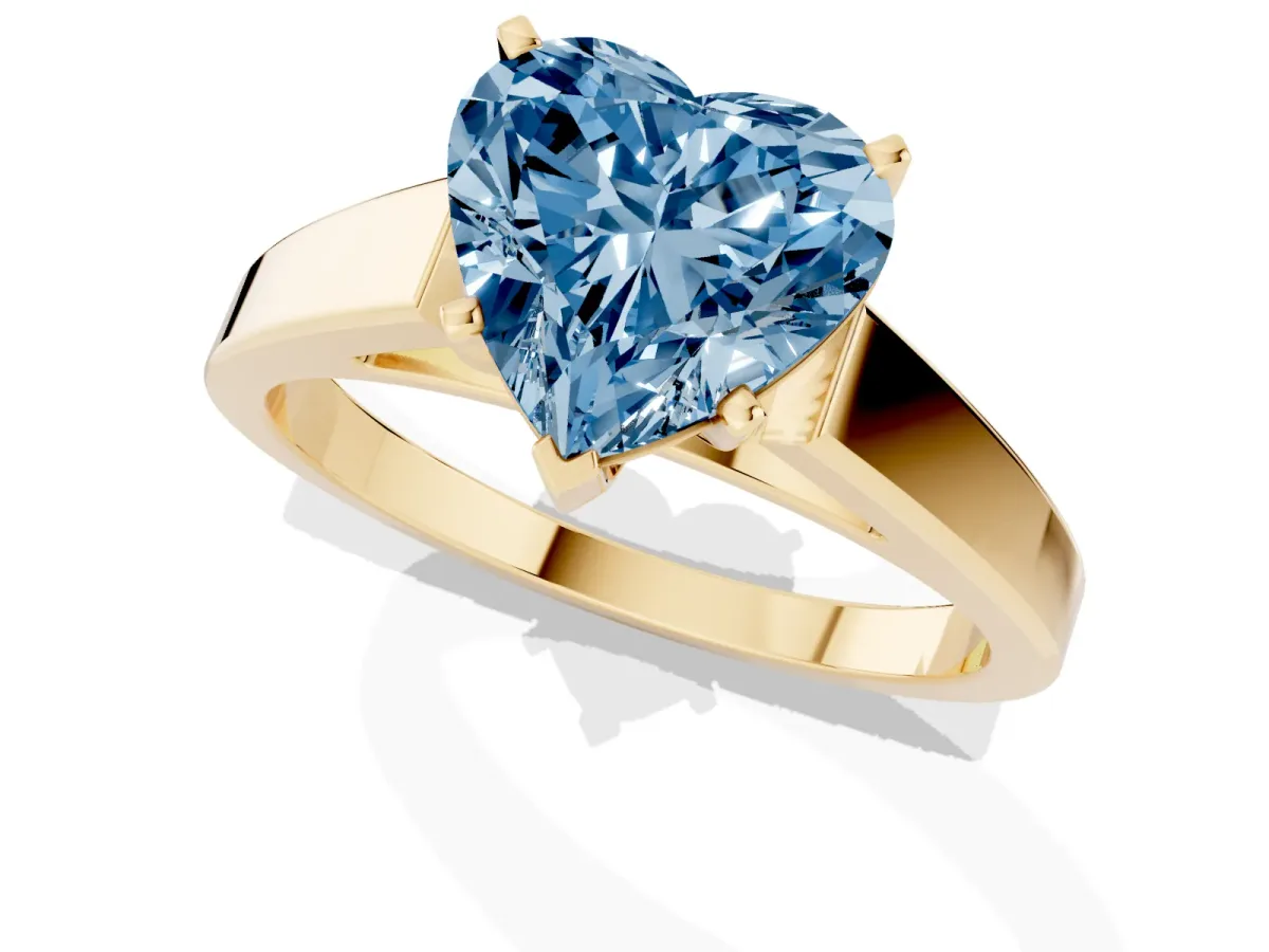 Fancy Blue Heart Cut Solitaire Engagement Ring with Four-Prong Setting and Tapered Band Yellow gold