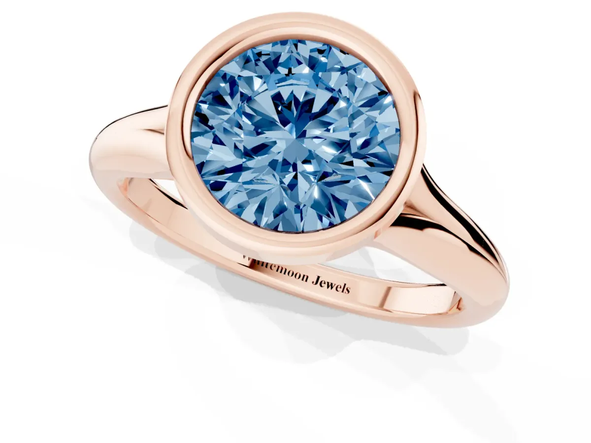 Fancy Blue Bezel Set Round Cut Solitaire Diamond Ring with Smooth Band Rose gold