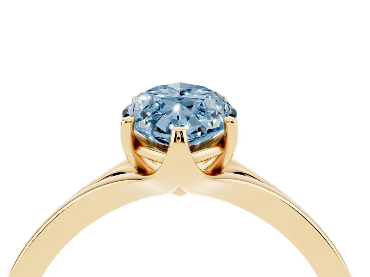 Fancy Blue Marquise Cut Solitaire Diamond Ring with Six-Prong Setting and Tapered Band Yellow gold