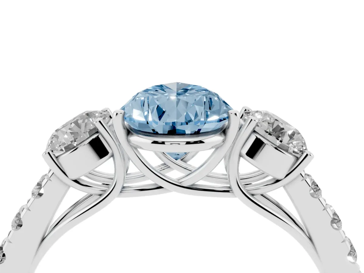 Fancy Blue Pear Cut Cut Diamond Three-Stone Ring with Round Side Stones and Pavé Band Silver