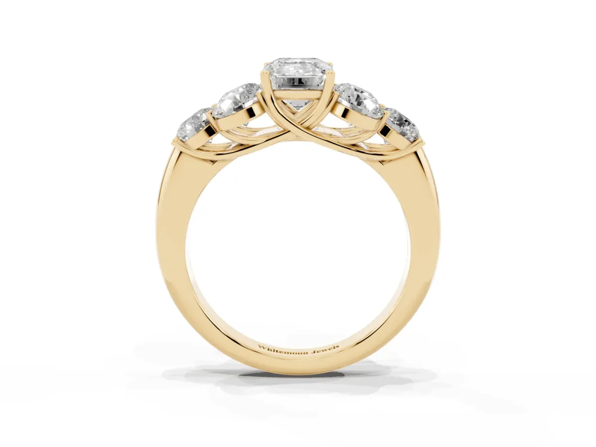 Emerald Cut Cut Diamond Cluster Ring with Round Accent Stones and Prong Setting on a Classic Band Yellow gold