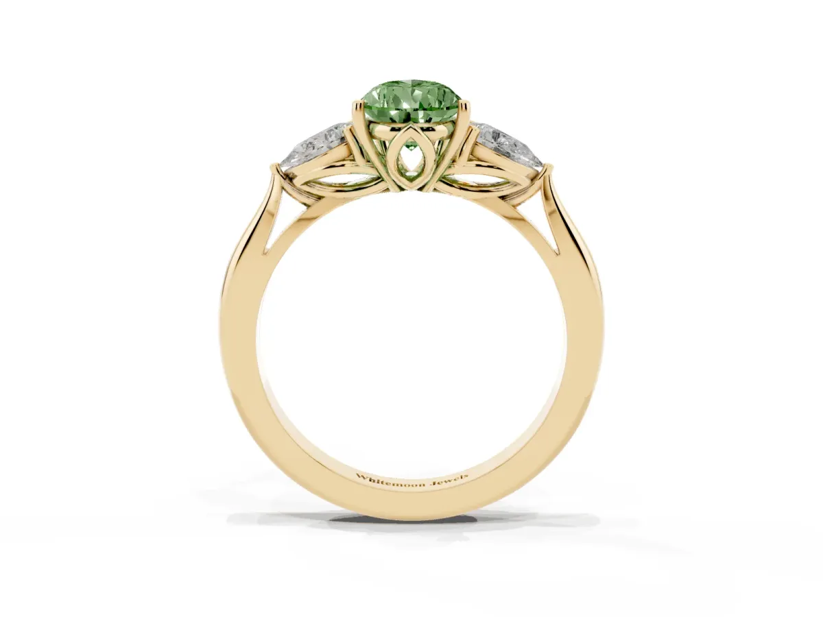 Fancy Green Three-Stone Pear Cut Brilliant Diamond Solitaire Ring with Tapered Band and Four-Prong Setting Yellow gold