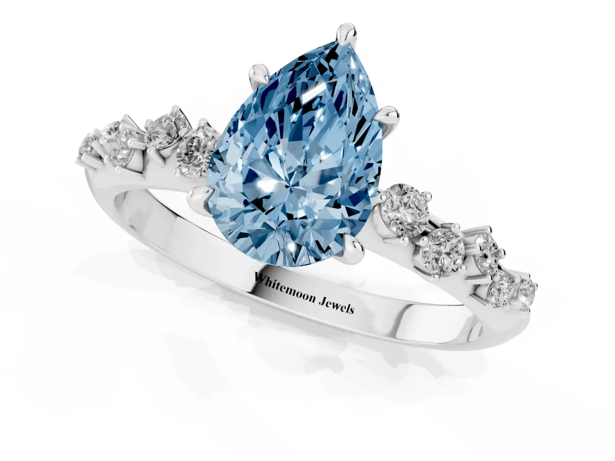 Fancy Blue Pear Cut Diamond Cluster Side Stone Solitaire Ring with Prong Setting Silver