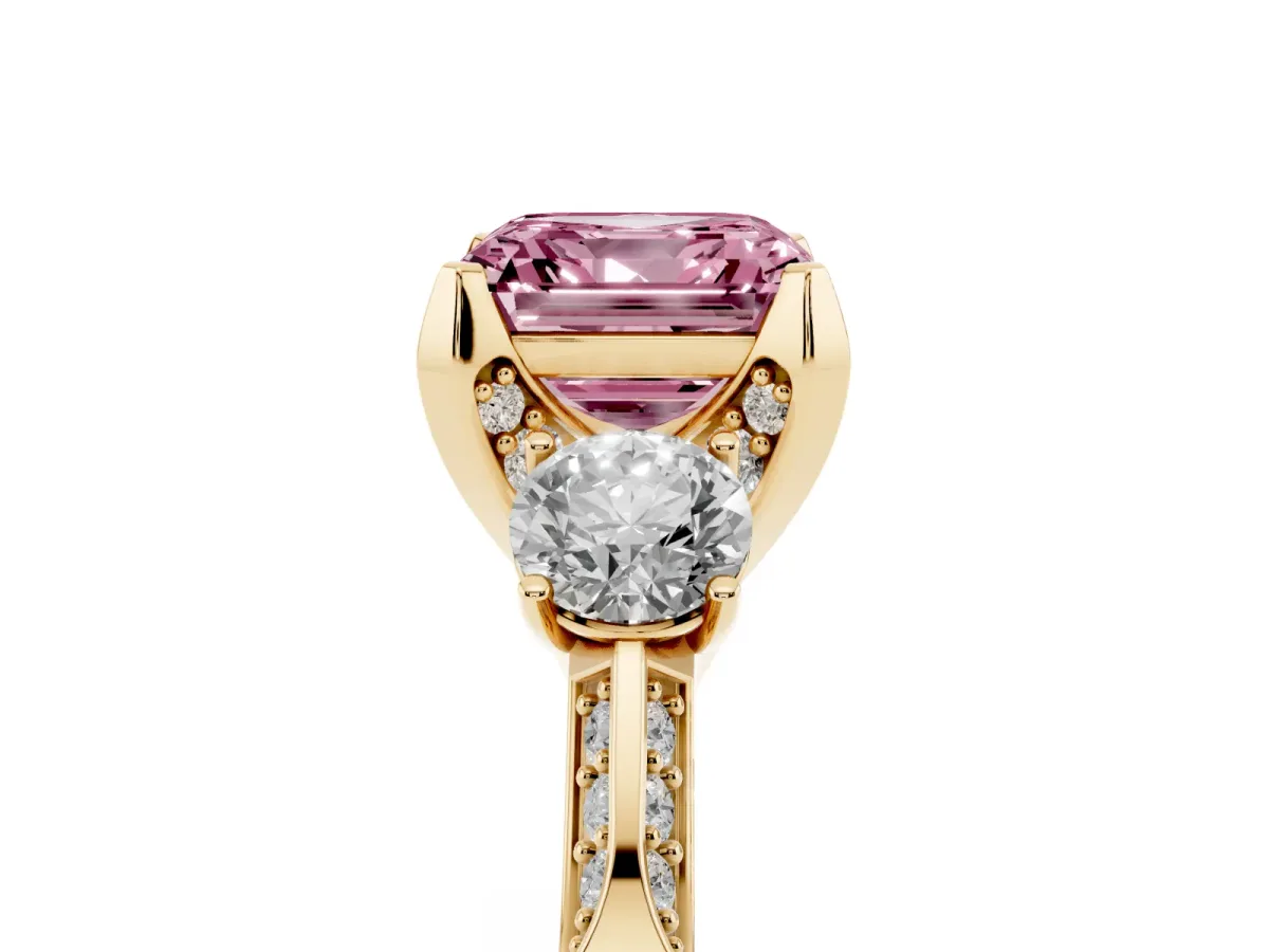 Fancy Pink Asscher Cut Brilliant Three-Stone Diamond Ring with Pavé Band and Four-Prong Setting Yellow gold