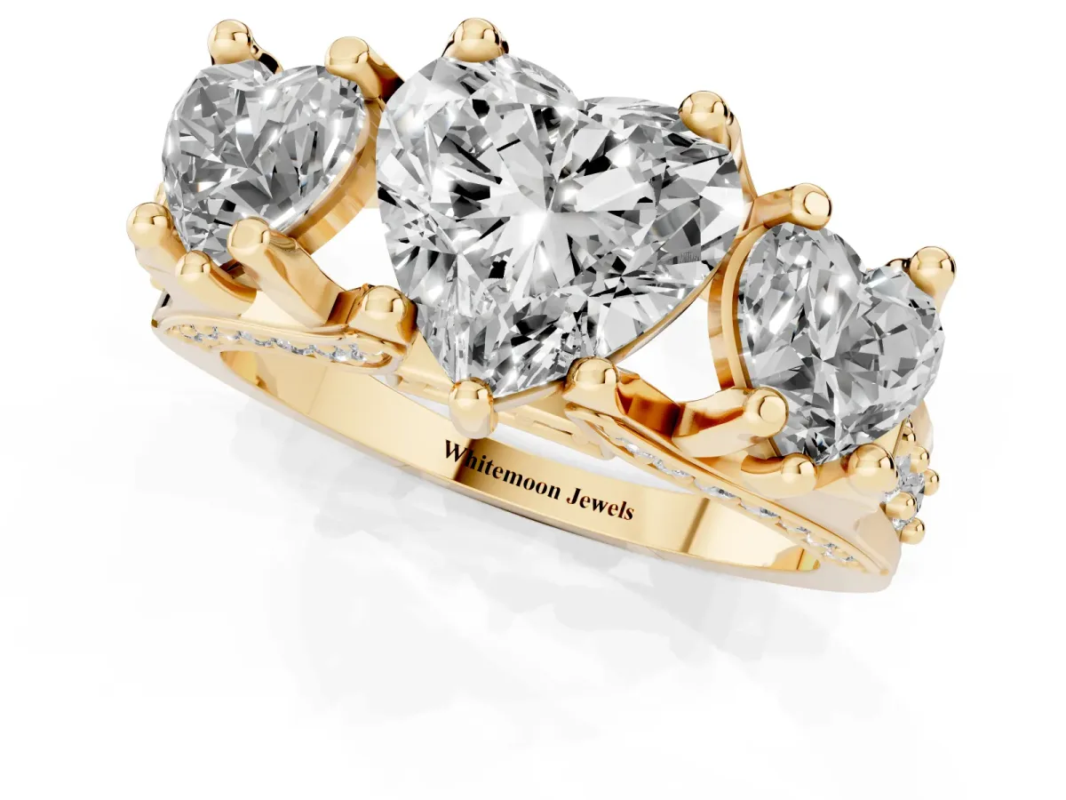Heart Cut Diamond Three-Stone Ring with Channel Set Band and Four-Prong Setting Yellow gold