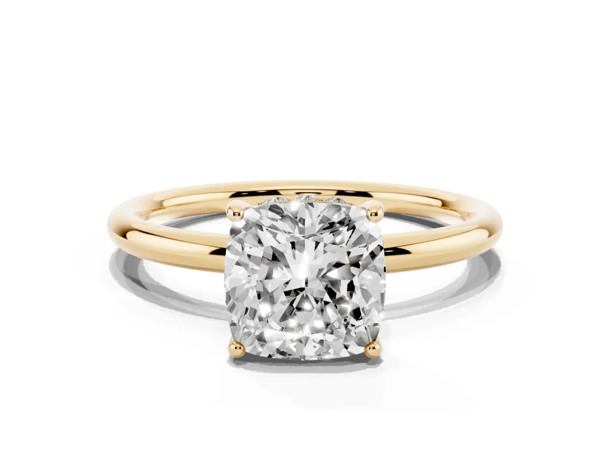Cushion Cut Solitaire Diamond Ring with a Classic Band and Four-Prong Setting Yellow gold