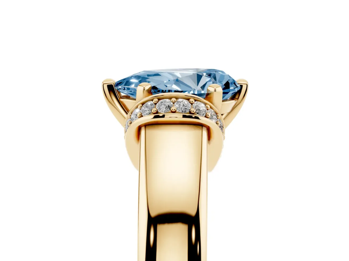 Fancy Blue Pear Cut Solitaire Diamond Ring with Pave Band and Six-Prong Setting Yellow gold