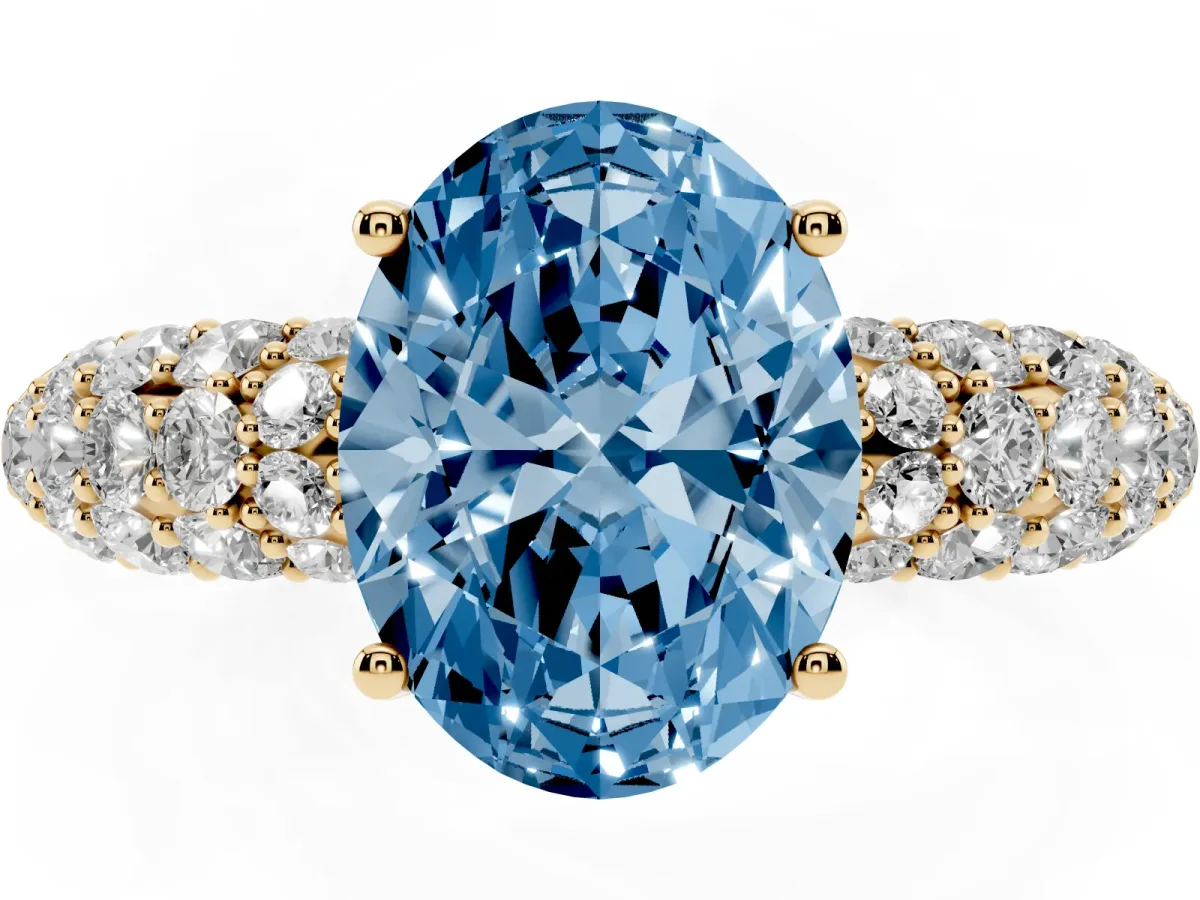 Fancy Blue Oval Cut Diamond Pavé Band Solitaire Ring with Four-Prong Setting Yellow gold