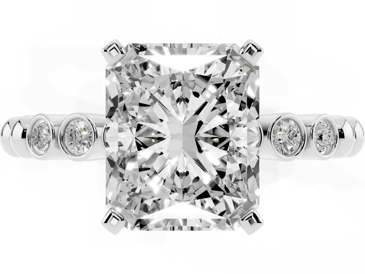 Radiant Cut Solitaire Bezel Accent Diamond Engagement Ring with Beaded Band and Four-Prong Setting Silver