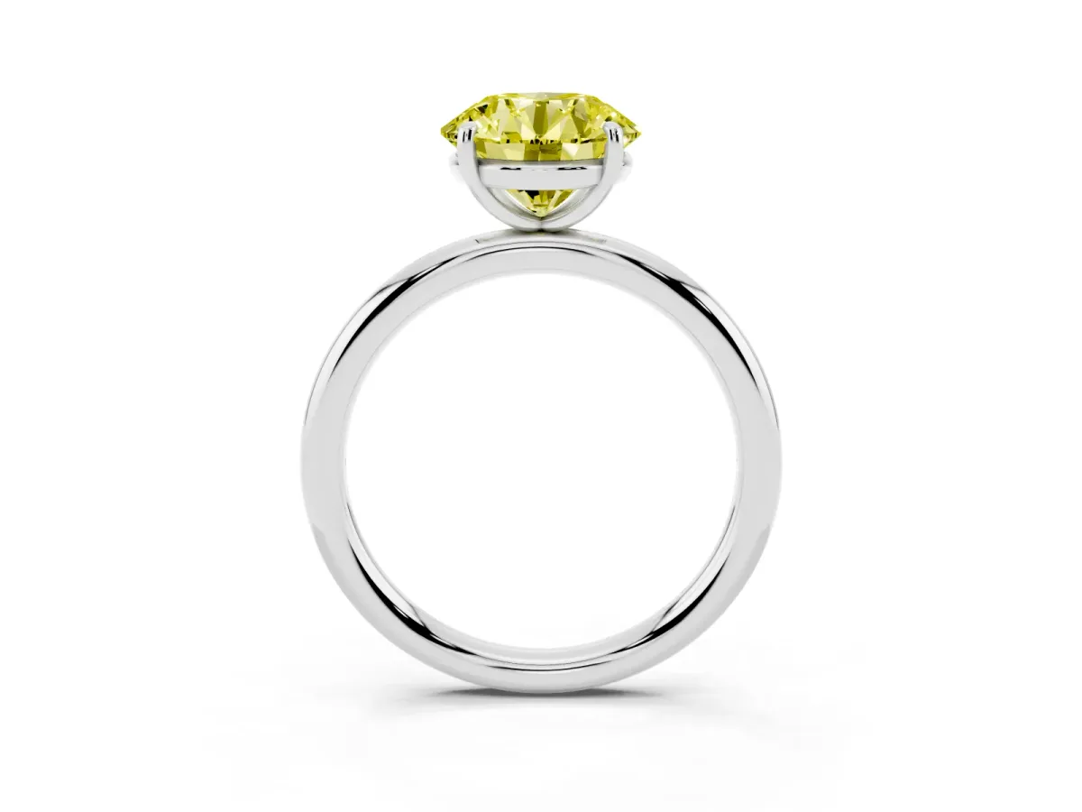 Fancy Yellow Round Cut Solitaire Diamond Ring with Four-Prong Setting on a Plain Band White gold