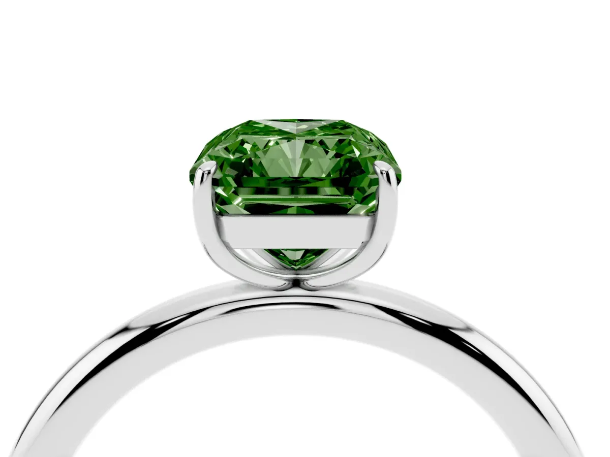 Fancy Green Radiant Cut Solitaire Diamond Ring with Four-Prong Setting on a Plain Band Platinum