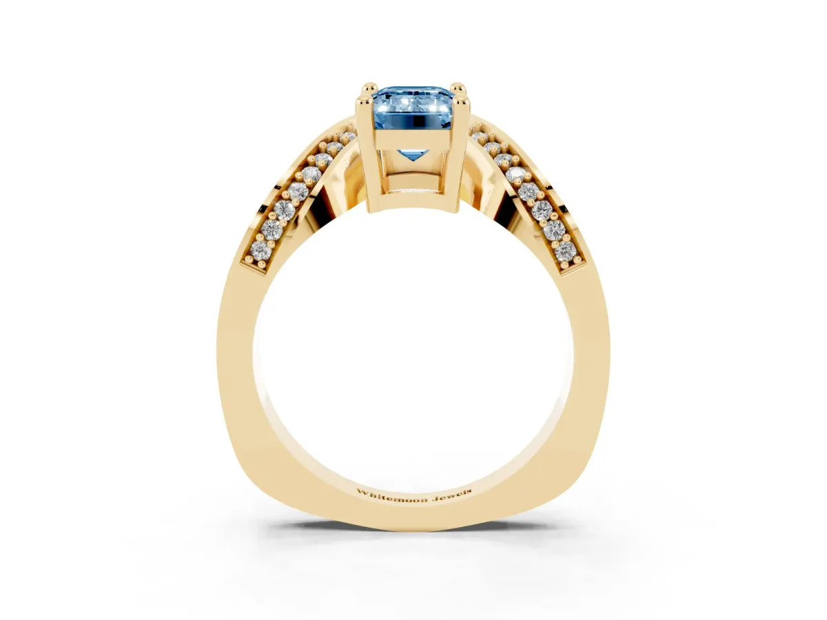 Fancy Blue Emerald Cut Solitaire Diamond Engagement Ring with Pave Band and Four-Prong Setting Yellow gold