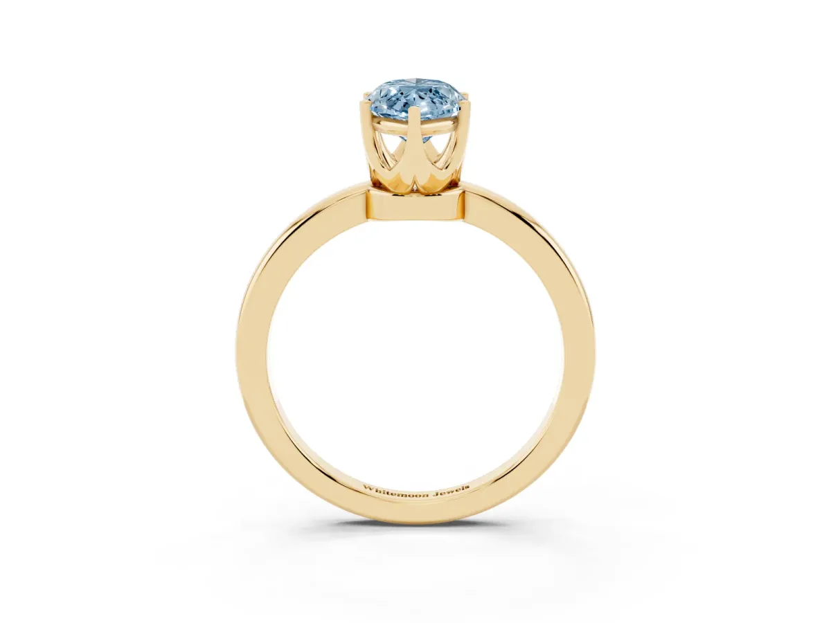 Fancy Blue Marquise Cut Solitaire Diamond Ring with Six-Prong Setting on a Classic Band Yellow gold