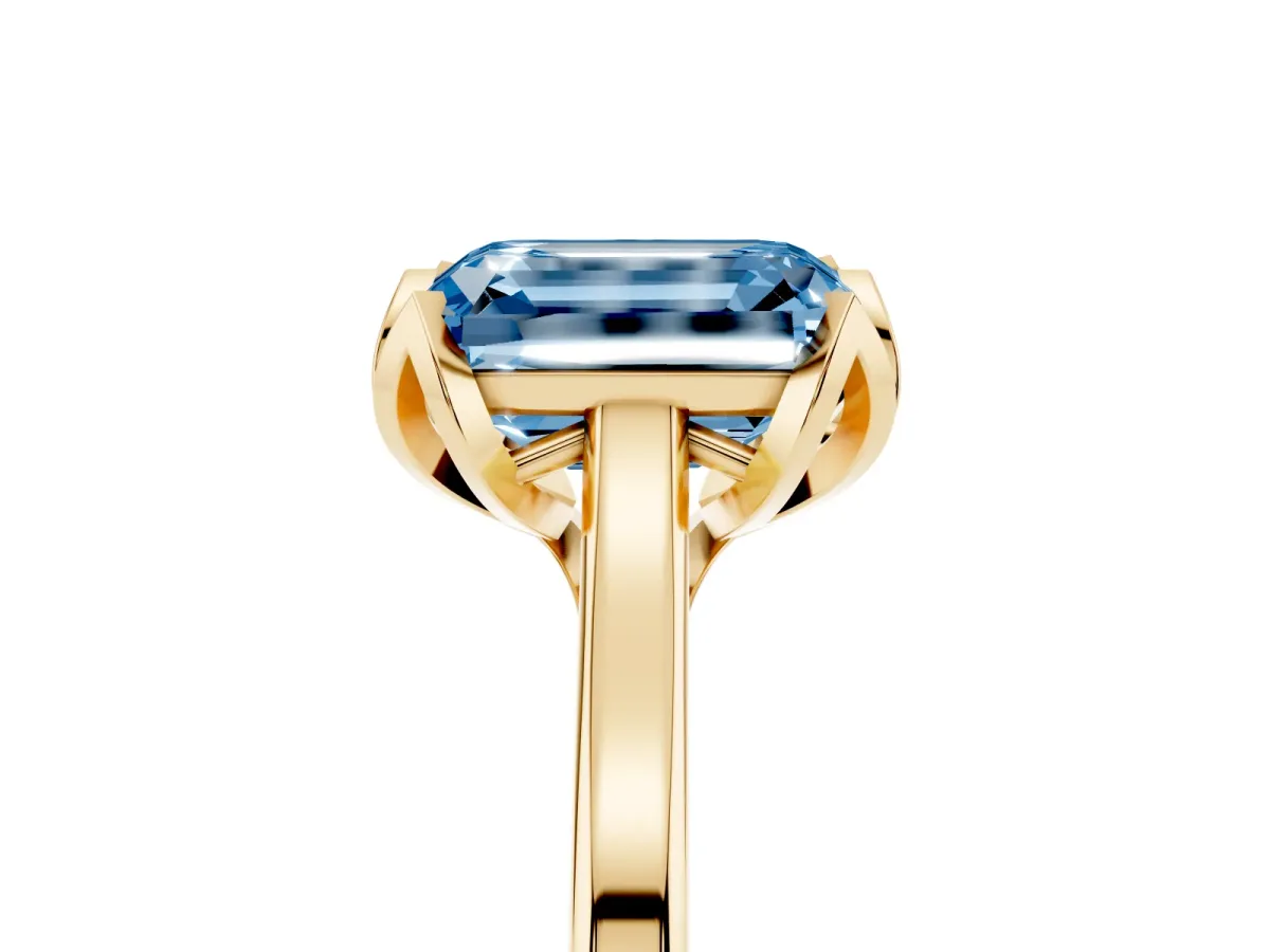 Fancy Blue Emerald Cut Diamond Solitaire Ring with Flower Prong Setting and Classic Band Yellow gold