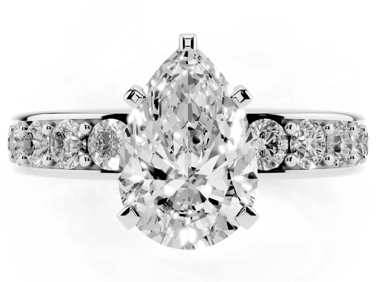 Pear Cut Diamond Engagement Ring with Channel Set Round Band and Prong Setting Silver