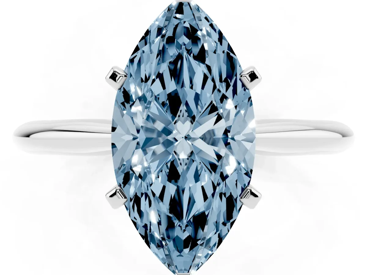 Fancy Blue Marquise Cut Cut Solitaire Ring with Four-Prong Setting on a Classic Band Silver