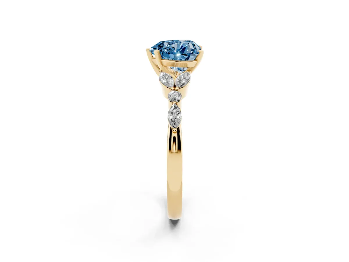Fancy Blue Heart Cut Diamond Solitaire Ring with Side Stones and Four-Prong Setting Yellow gold