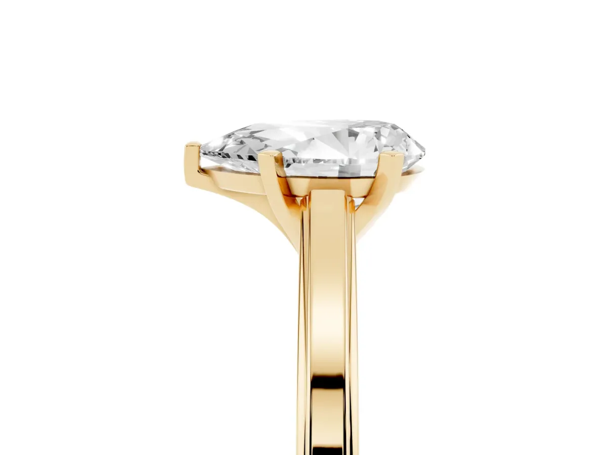 Pear Cut Solitaire Diamond Ring with Four-Prong Setting and Classic Band Yellow gold