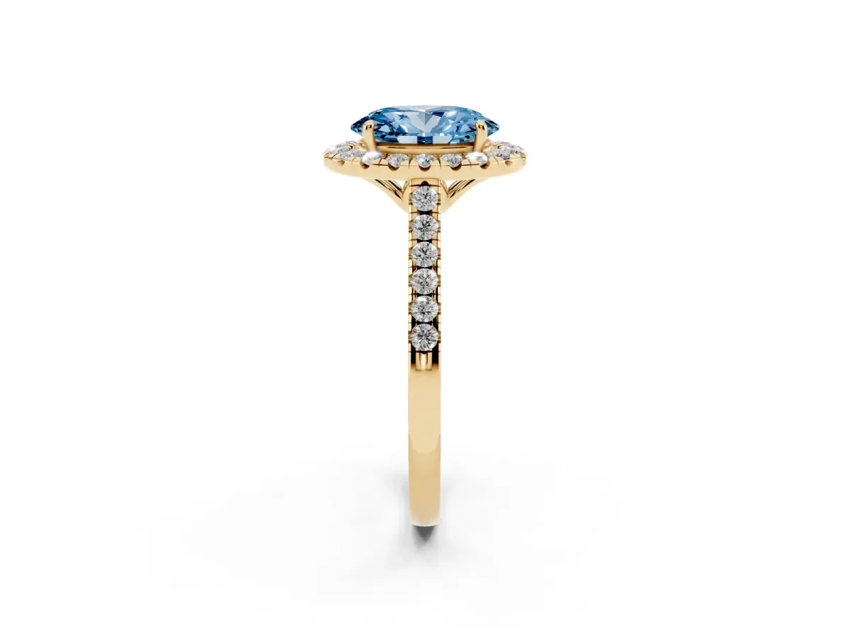 Fancy Blue Oval Cut Halo Pavé Diamond Engagement Ring with Four-Prong Setting Yellow gold