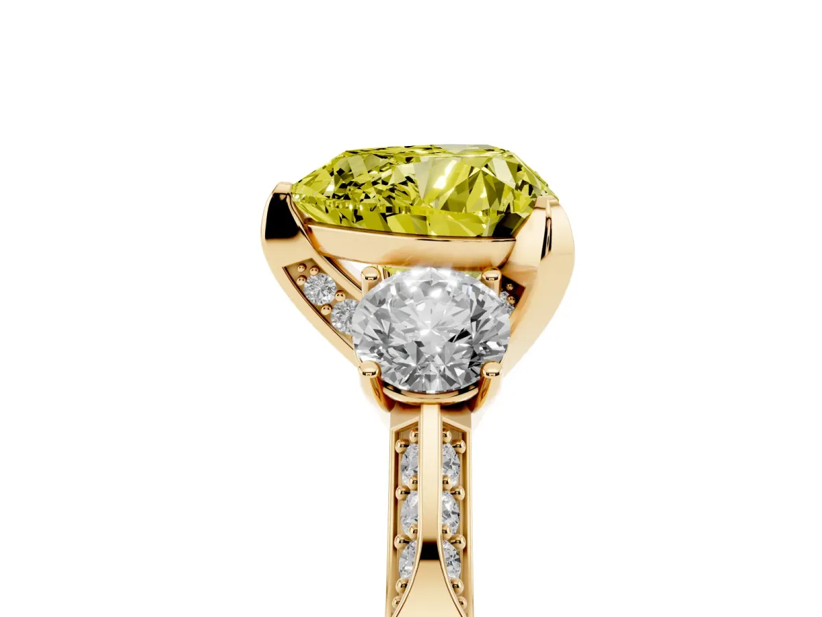 Fancy Yellow Heart Cut Brilliant Three-Stone Diamond Ring with Pavé Band and Four-Prong Setting Yellow gold