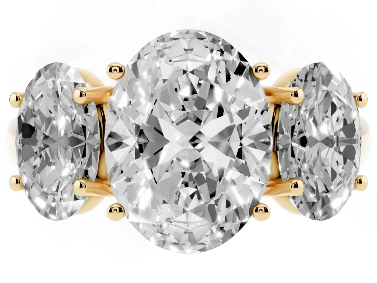 Three-Stone Oval Cut Diamond Engagement Ring with Prong Setting Yellow gold