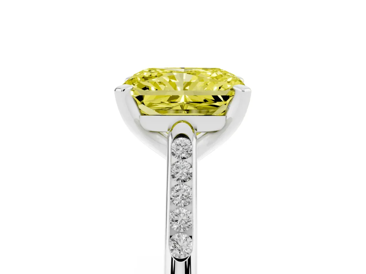 Fancy Yellow Radiant Cut Diamond Solitaire Ring with Channel Set Round Band and Prong Setting Platinum