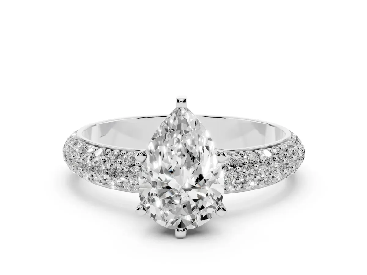 Pear Cut Diamond Solitaire Ring with Prong Setting and Pavé Band Platinum