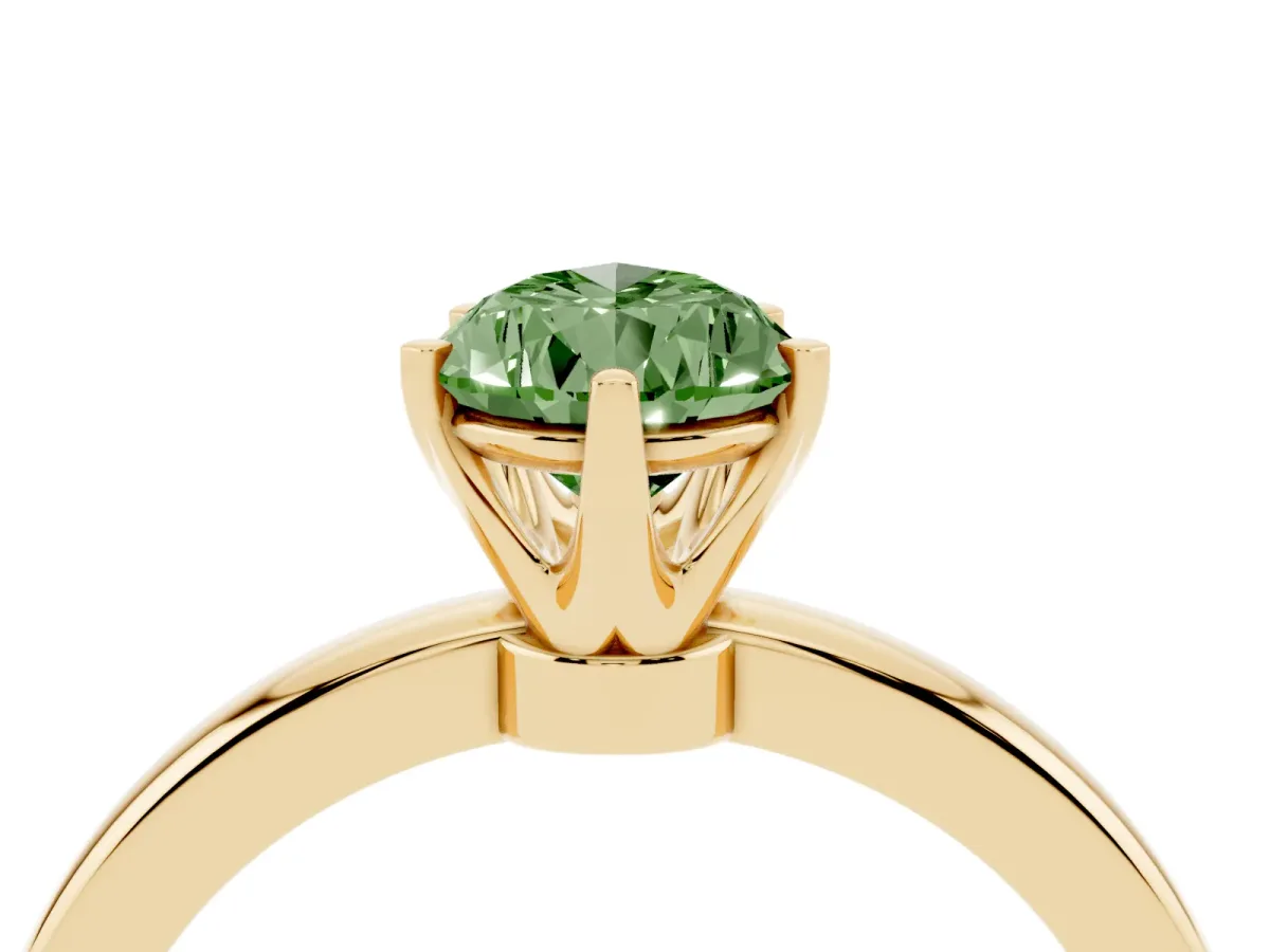 Fancy Green Pear Cut Solitaire Diamond Ring with Six-Prong Setting on a Classic Band Yellow gold