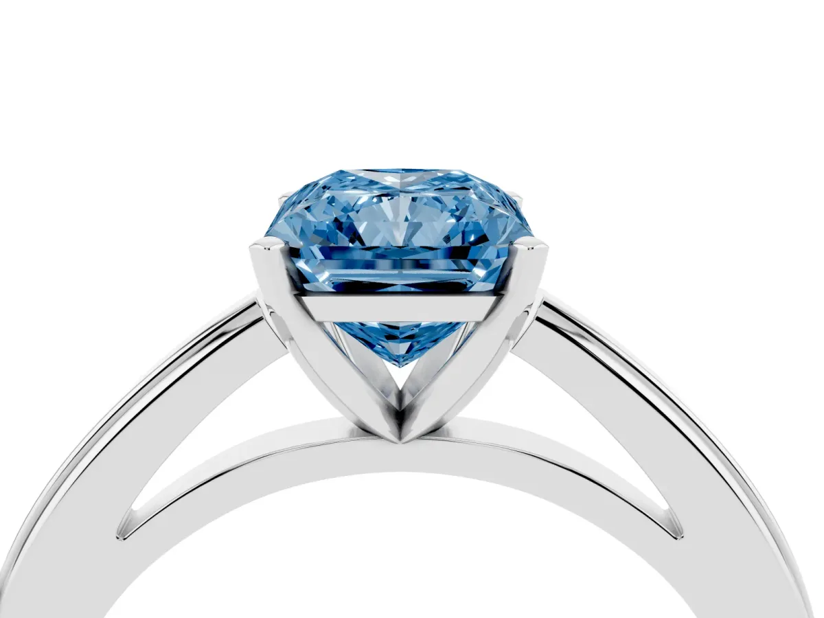 Fancy Blue Radiant Cut Solitaire Diamond Ring with Four-Prong Setting and Classic Band Platinum