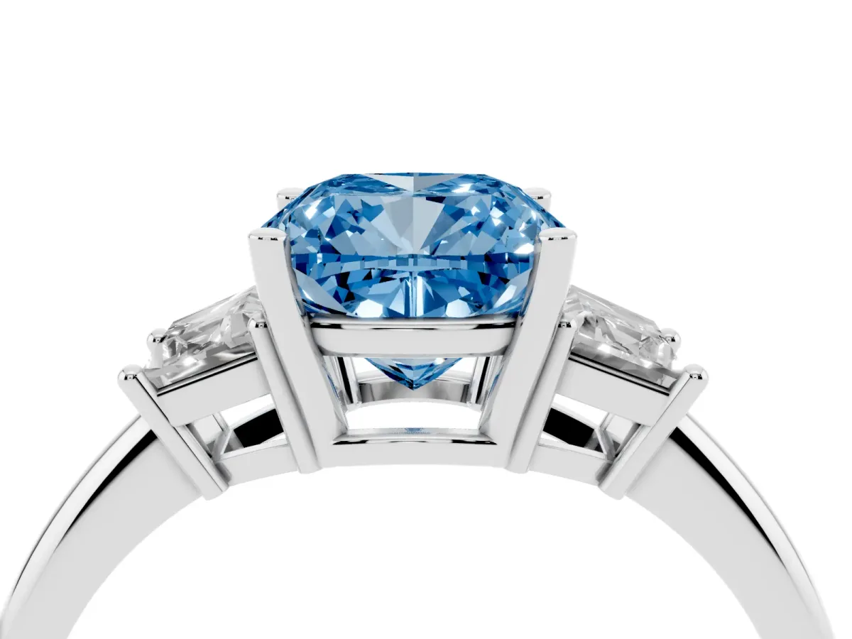 Fancy Blue Cushion Cut Diamond Three-Stone Ring with Trapezoid Side Stones and Prong Setting Platinum