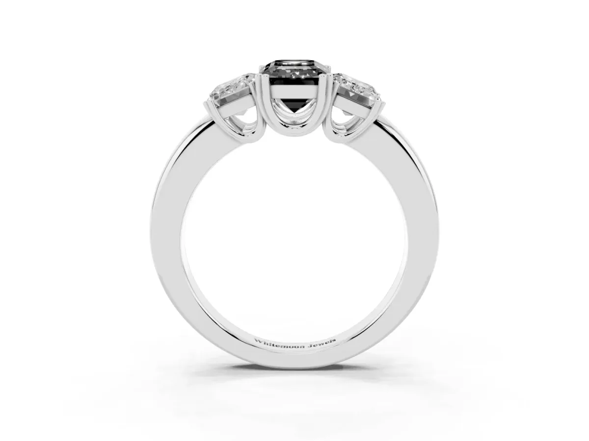Fancy Black Three-Stone Emerald Cut Cut Diamond Ring with Channel Set Band and Four-Prong Setting Silver