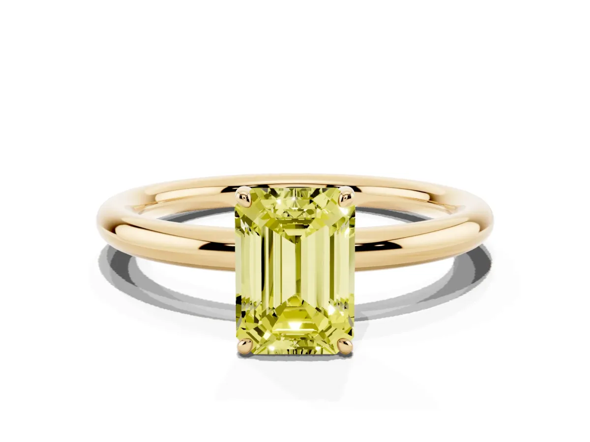 Fancy Yellow Emerald Cut Solitaire Diamond Ring with Four-Prong Setting on a Plain Band Yellow gold