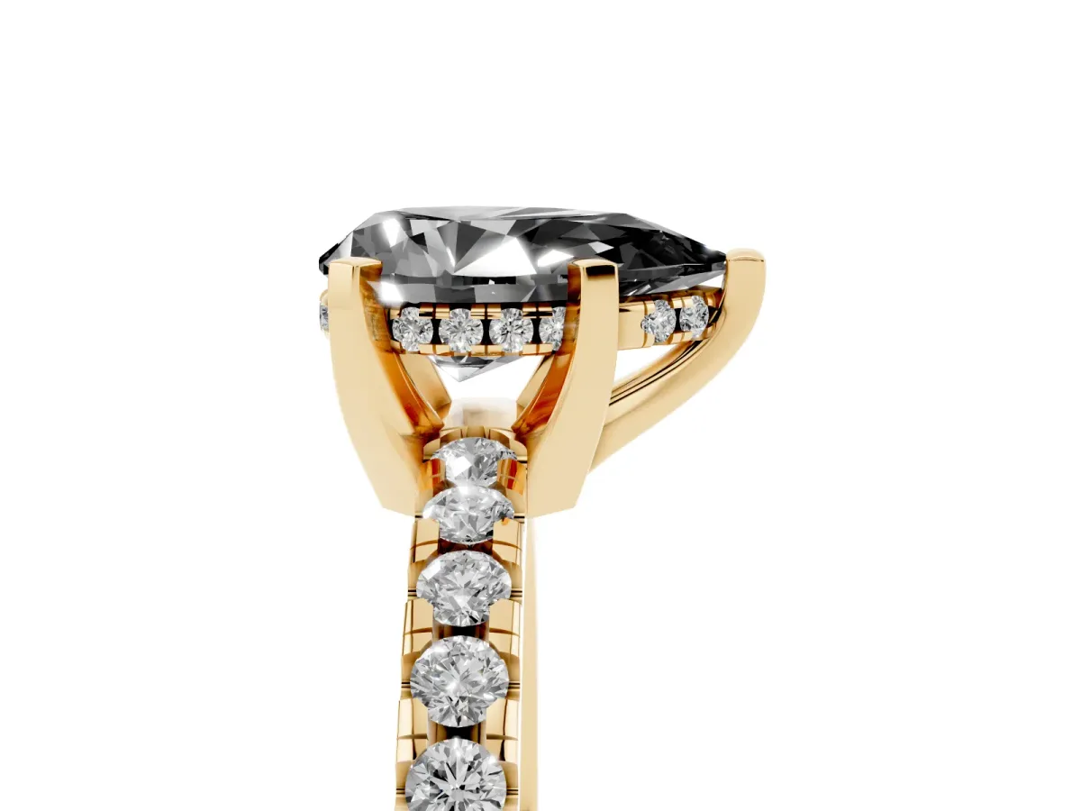 Fancy Black Pear Cut Diamond Solitaire Ring with Round Pavé Band and Four-Prong Setting Yellow gold